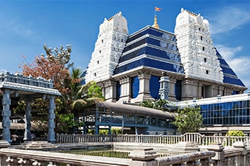 Reach ISKCON Temple Bangalore with taxi services to experience spiritual and modern architecture.