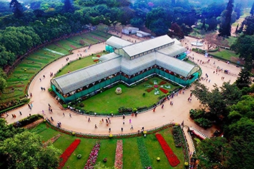 Visit Lalbagh Botanical Garden in Bangalore with vibrant flowers and peaceful walking paths.