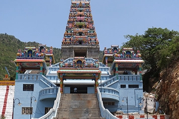 Hire a cab or taxi to visit Marudhamalai Hill Temple, a famous Lord Murugan temple with scenic views.