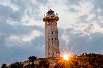 Reach the historic Old Lighthouse by taxi for panoramic sea and town views.