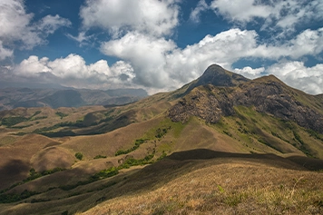 Visit Anamudi Peak with Relaxing and Comfortable Cab Rides Visit the scenic beauty of Anamudi Peak with safe, relaxing, and comfortable cab ride services.